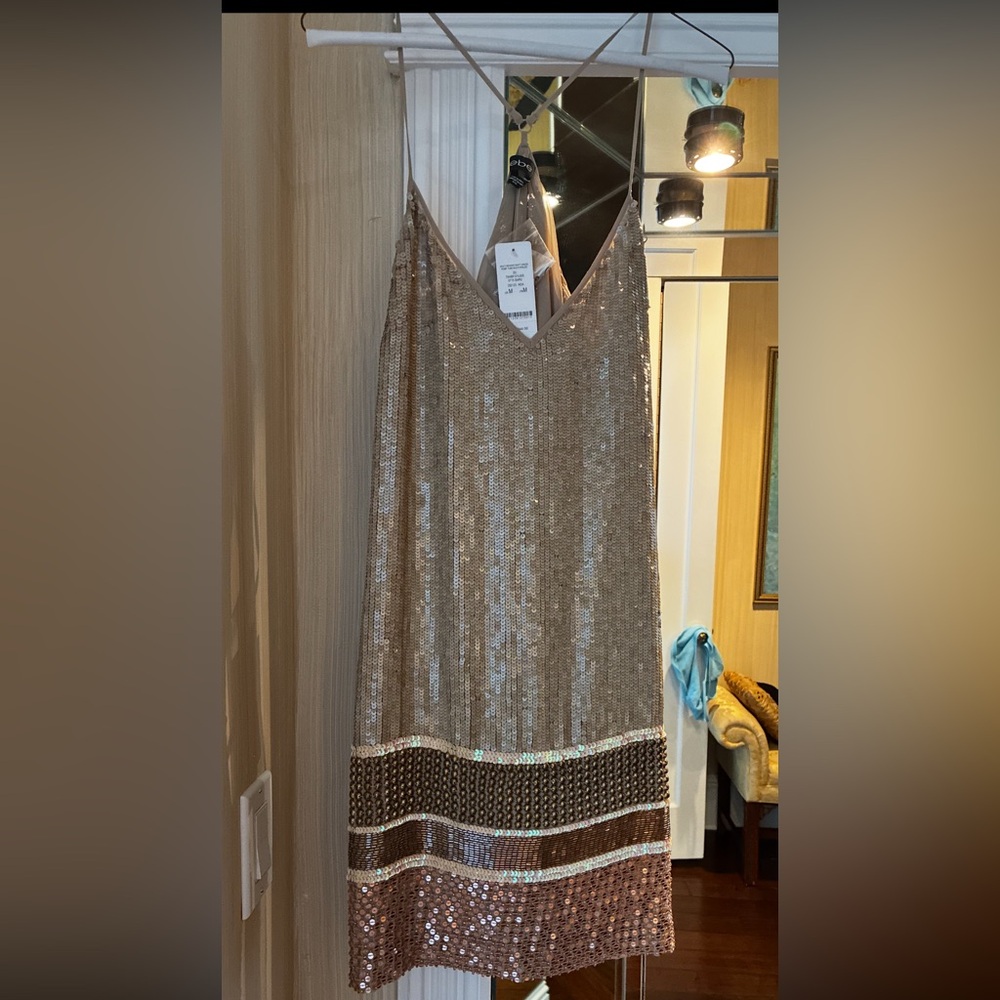 Bebe beaded shift dress
NWT